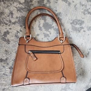 31. London Fog faux leather hand bag.